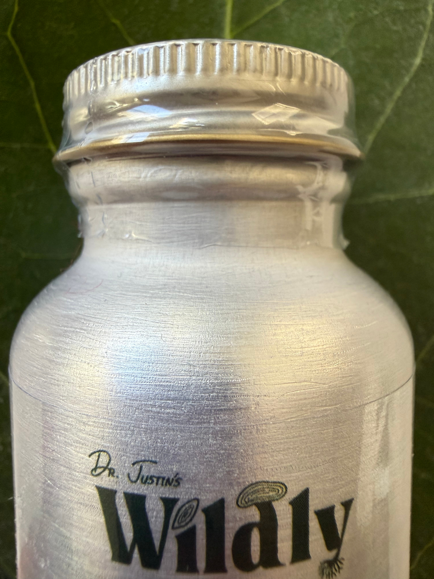 Close-up of Wolfora bottle shrink wrap seal